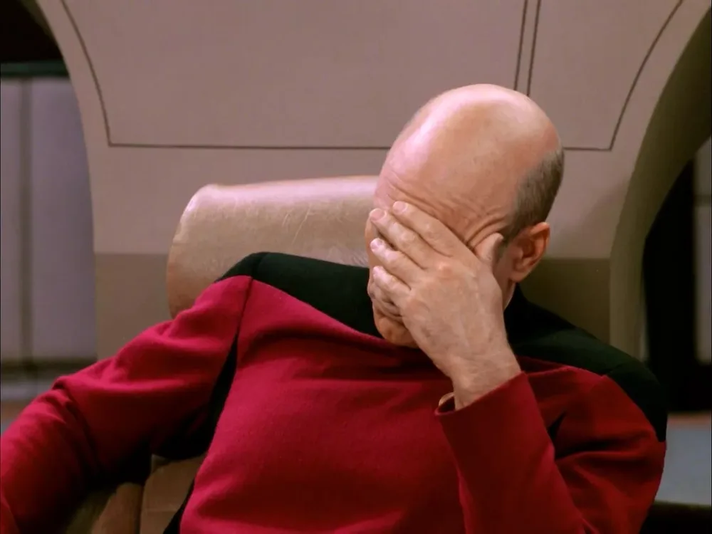 Captain-Picard-Face-Palm | Geeky Human Captain Jean-Luc Picard covers his face with his hand in Star Trek: The Next Generation.